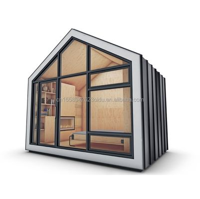 Τροποποιημένο μεταγωγικό κοντέινερ Prefab House Τριγωνική οροφή και σταθερό ξύλινο θεμέλιο για κατοικίες χάλυβα κοντέινερ σπίτι